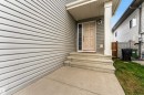 Welcoming front entrance with concrete steps and a covered porch - 463 Tamarack Green, Edmonton, AB  - Outdoor With Exterior 