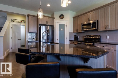14207 138 Street Nw, Edmonton, AB - Indoor Photo Showing Kitchen With Stainless Steel Kitchen With Double Sink With Upgraded Kitchen