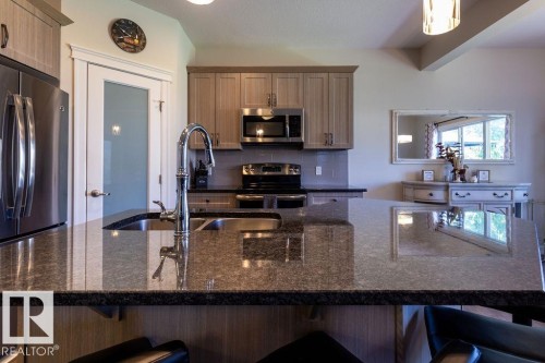 14207 138 Street Nw, Edmonton, AB - Indoor Photo Showing Kitchen With Stainless Steel Kitchen With Double Sink With Upgraded Kitchen