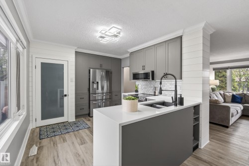 9344 63 Avenue, Edmonton, AB - Indoor Photo Showing Kitchen With Stainless Steel Kitchen With Double Sink With Upgraded Kitchen
