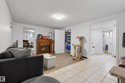 9344 63 Avenue, Edmonton, AB - Indoor Photo Showing Living Room With Fireplace