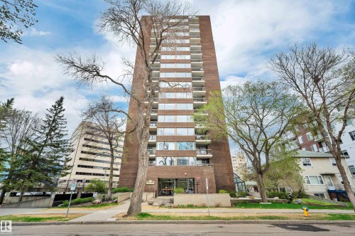 Brick facade high-rise building featuring multiple levels of balconies - 1603 10025 113 Street, Edmonton, AB - Outdoor With Facade