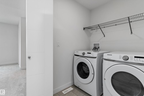 623 Black, Leduc, AB - Indoor Photo Showing Laundry Room