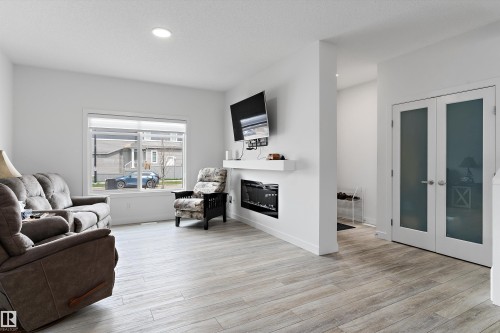 623 Black, Leduc, AB - Indoor Photo Showing Living Room With Fireplace