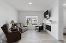 623 Black Stone Boulevard, Leduc, AB  - Indoor Photo Showing Living Room With Fireplace 