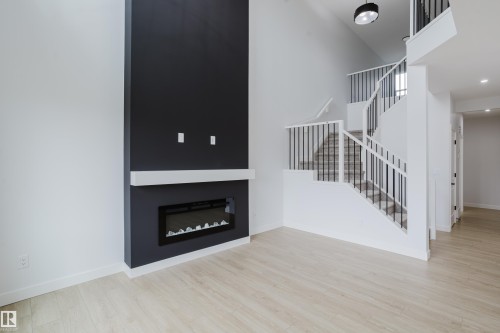 6219 29 Avenue, Edmonton, AB - Indoor Photo Showing Living Room With Fireplace