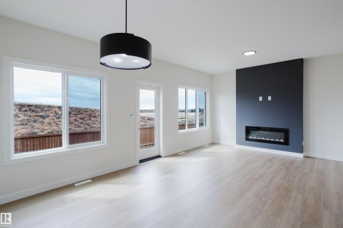 6223 29 Avenue, Edmonton, AB - Indoor Photo Showing Living Room With Fireplace