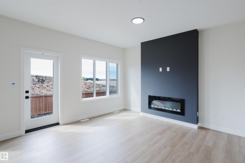 6223 29 Avenue, Edmonton, AB - Indoor Photo Showing Living Room With Fireplace