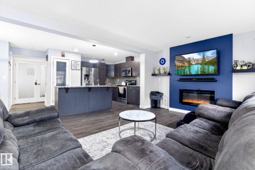 308 42 Avenue, Edmonton, AB - Indoor Photo Showing Living Room With Fireplace