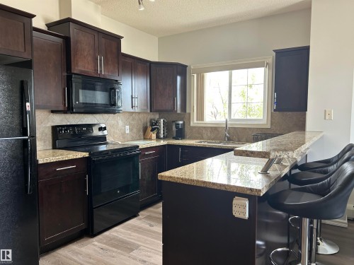 341 263 Macewan Road, Edmonton, AB - Indoor Photo Showing Kitchen