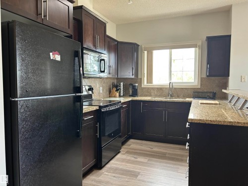 341 263 Macewan Road, Edmonton, AB - Indoor Photo Showing Kitchen