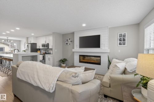 2513 Price Way, Edmonton, AB - Indoor Photo Showing Living Room With Fireplace