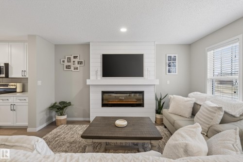 2513 Price Way, Edmonton, AB - Indoor Photo Showing Living Room With Fireplace