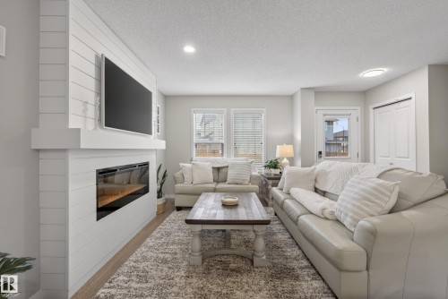 2513 Price Way, Edmonton, AB - Indoor Photo Showing Living Room With Fireplace