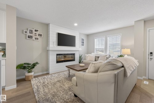 2513 Price Way, Edmonton, AB - Indoor Photo Showing Living Room With Fireplace