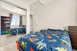 Bedroom featuring carpeted flooring and white painted walls - 