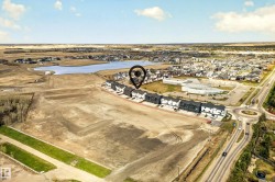 Aerial perspective showcasing a row of contemporary townhomes - 