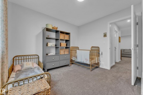 Image quality insufficient for description - 17319 2 St Nw, Edmonton, AB - Indoor Photo Showing Bedroom