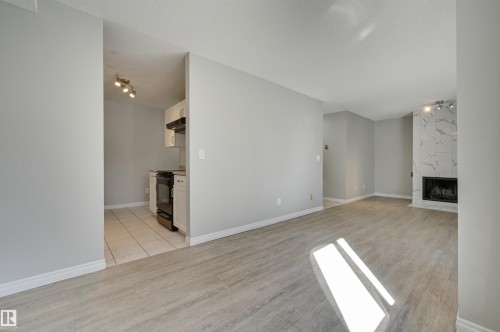 113 10838 108 Street, Edmonton, AB - Indoor With Fireplace