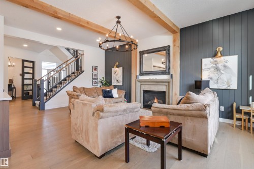 5501 109A Street, Edmonton, AB - Indoor Photo Showing Living Room With Fireplace
