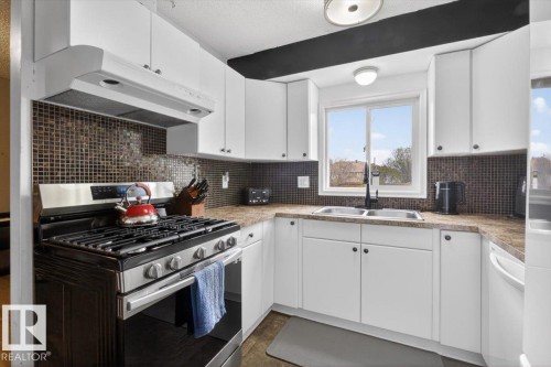 8409 99 Avenue, Fort Saskatchewan, AB - Indoor Photo Showing Kitchen With Double Sink