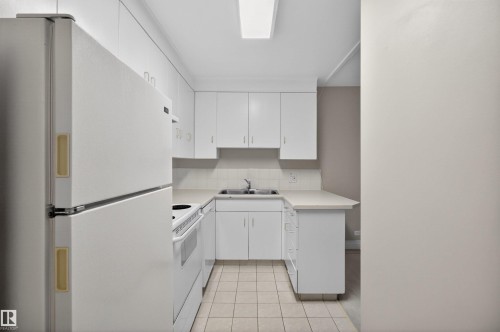 304 12207 Jasper Avenue, Edmonton, AB - Indoor Photo Showing Kitchen With Double Sink