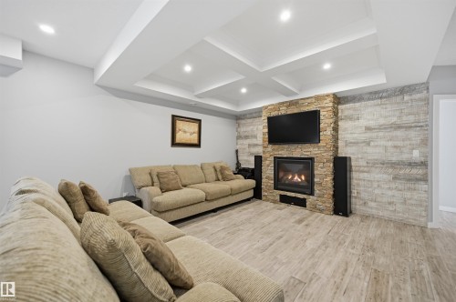 4547 Mead Crest, Edmonton, AB - Indoor Photo Showing Other Room With Fireplace