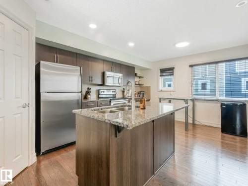 66 5317 3 Avenue, Edmonton, AB - Indoor Photo Showing Kitchen With Stainless Steel Kitchen With Double Sink With Upgraded Kitchen