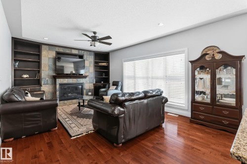 515 Callaghan Point(E), Edmonton, AB - Indoor Photo Showing Other Room With Fireplace