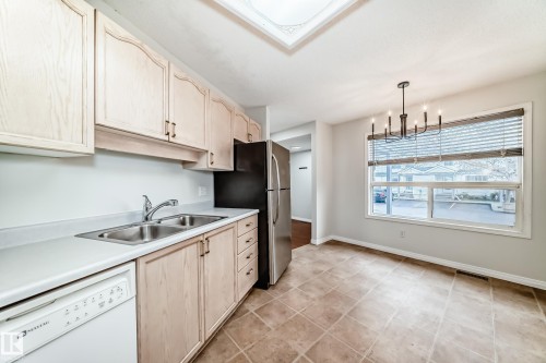 28 603 Youville Drive E, Edmonton, AB - Indoor Photo Showing Kitchen With Double Sink