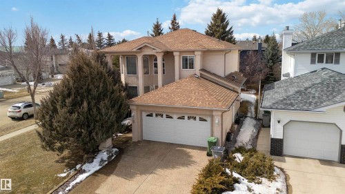 This property features a two-story design with stucco Exterior - #1 Colonial Close, Beaumont, AB - Outdoor