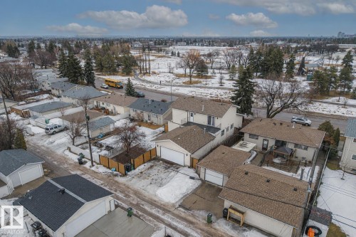 Rear aerial perspective showcasing a residential neighborhood with detached homes - 8812 135 Avenue, Edmonton, AB - Outdoor With View