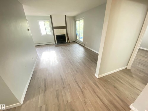 302 10826 113 Street, Edmonton, AB - Indoor With Fireplace