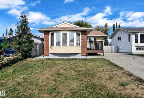 Single-story residence featuring a brick and siding facade with a prominent bay window - 3520 19 Avenue, Edmonton, AB - Outdoor