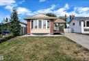 Single-story residence featuring a brick and siding facade with a prominent bay window - 3520 19 Avenue, Edmonton, AB  - Outdoor 