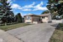 Ranch-style residence featuring a bay window and brick accent facade - 3520 19 Avenue, Edmonton, AB  - Outdoor 
