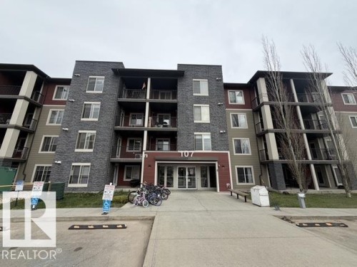 Modern multi-story building featuring a textured stone facade and varied siding - 321 107 Watt Common, Edmonton, AB - Outdoor With Balcony With Facade