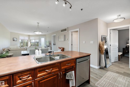 301 530 Hooke Road, Edmonton, AB - Indoor Photo Showing Kitchen With Double Sink