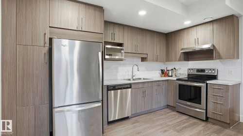 11002 University Avenue, Edmonton, AB - Indoor Photo Showing Kitchen With Double Sink With Upgraded Kitchen