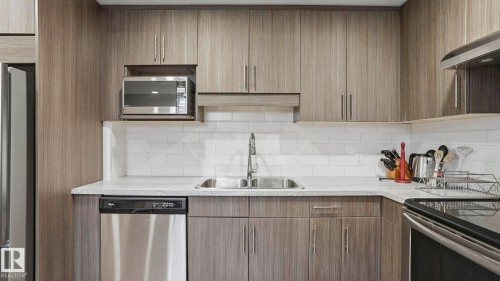 11002 University Avenue, Edmonton, AB - Indoor Photo Showing Kitchen With Double Sink With Upgraded Kitchen