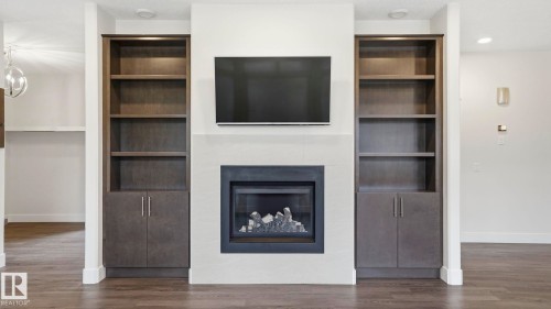 11002 University Avenue, Edmonton, AB - Indoor Photo Showing Living Room With Fireplace