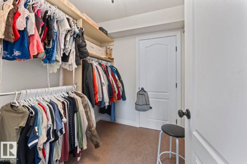 This closet features wall-mounted shelving and clothing rods providing storage space - 515 Lakeshore Drive, Cold Lake, AB - Indoor With Storage