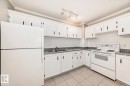 11 2024 57 Street, Edmonton, AB  - Indoor Photo Showing Kitchen With Double Sink 