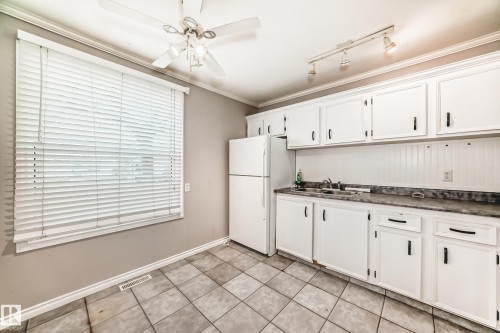 11 2024 57 Street, Edmonton, AB - Indoor Photo Showing Kitchen With Double Sink