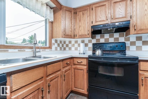 10812 52 Avenue, Edmonton, AB - Indoor Photo Showing Kitchen With Double Sink
