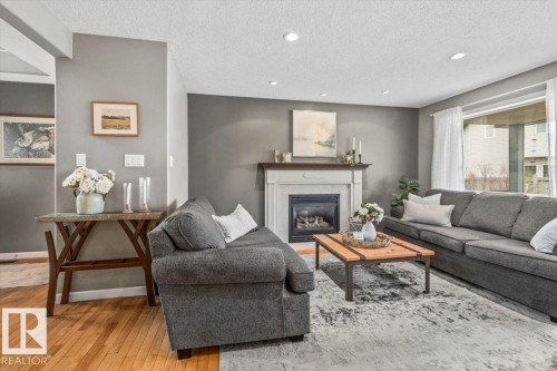 4 Hunt Court, St. Albert, AB - Indoor Photo Showing Living Room With Fireplace