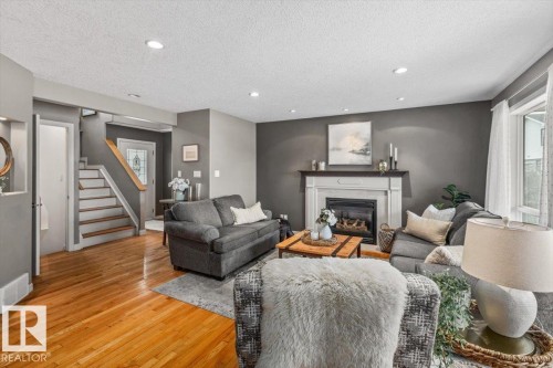 4 Hunt Court, St. Albert, AB - Indoor Photo Showing Living Room With Fireplace