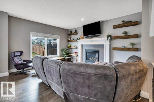 3721 Cherry Loop, Edmonton, AB - Indoor Photo Showing Living Room With Fireplace