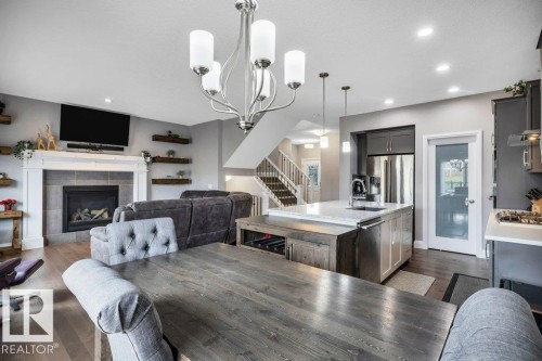 3721 Cherry Loop, Edmonton, AB - Indoor Photo Showing Other Room With Fireplace