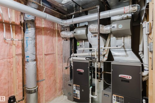 Dual Lennox HVAC systems, extensive ductwork, exposed copper and PEX plumbing, and insulated walls - 342 O'Connor Close, Edmonton, AB - Indoor Photo Showing Basement
